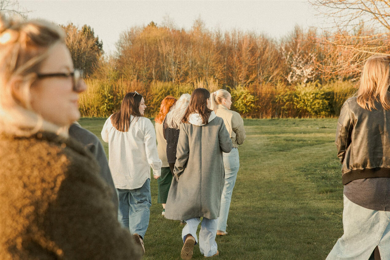 A group of women taking a walk during their retreat workshop.